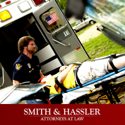 Houston personal injury victim on a stretcher being lifted into an ambulance